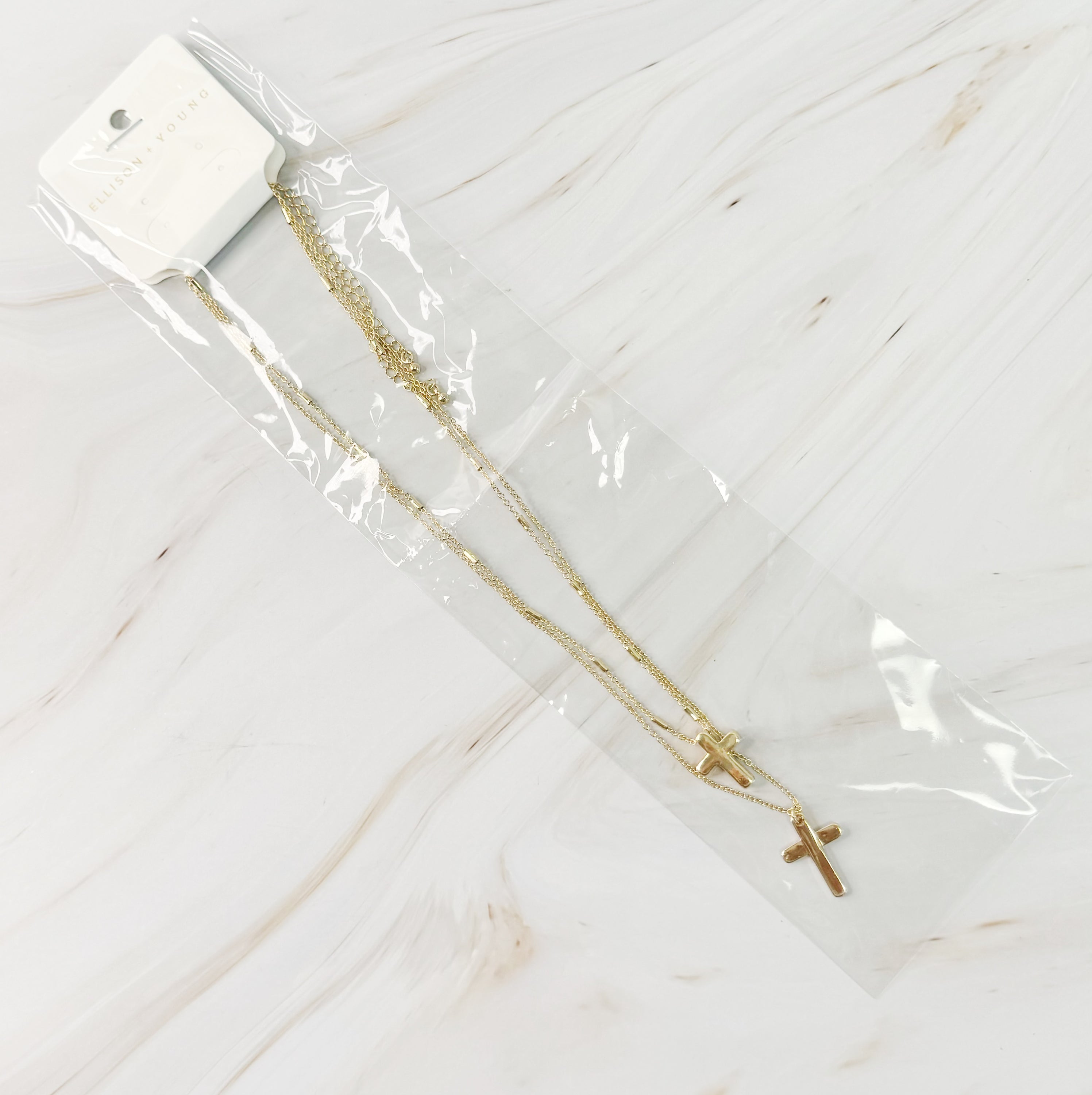 Pretty Chain Cross Necklace Set of 2 featuring modern cross designs on delicate chains, perfect for layering or solo wear.