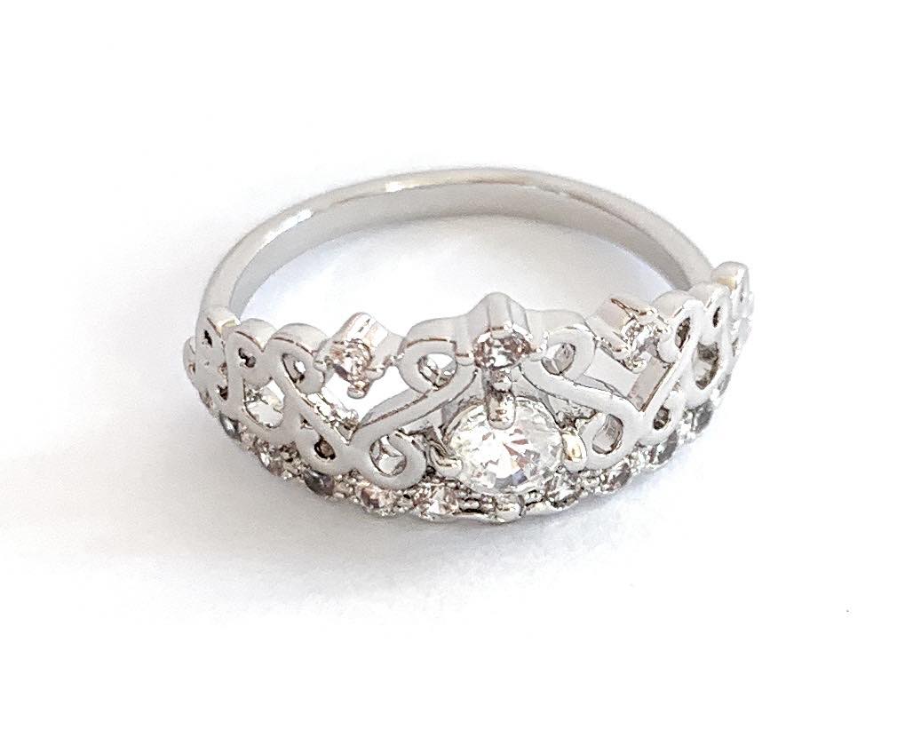 Elegant Princess Crown Ring with AAA+ Cubic Zirconia stones, featuring a luxurious 18k white gold plated design.