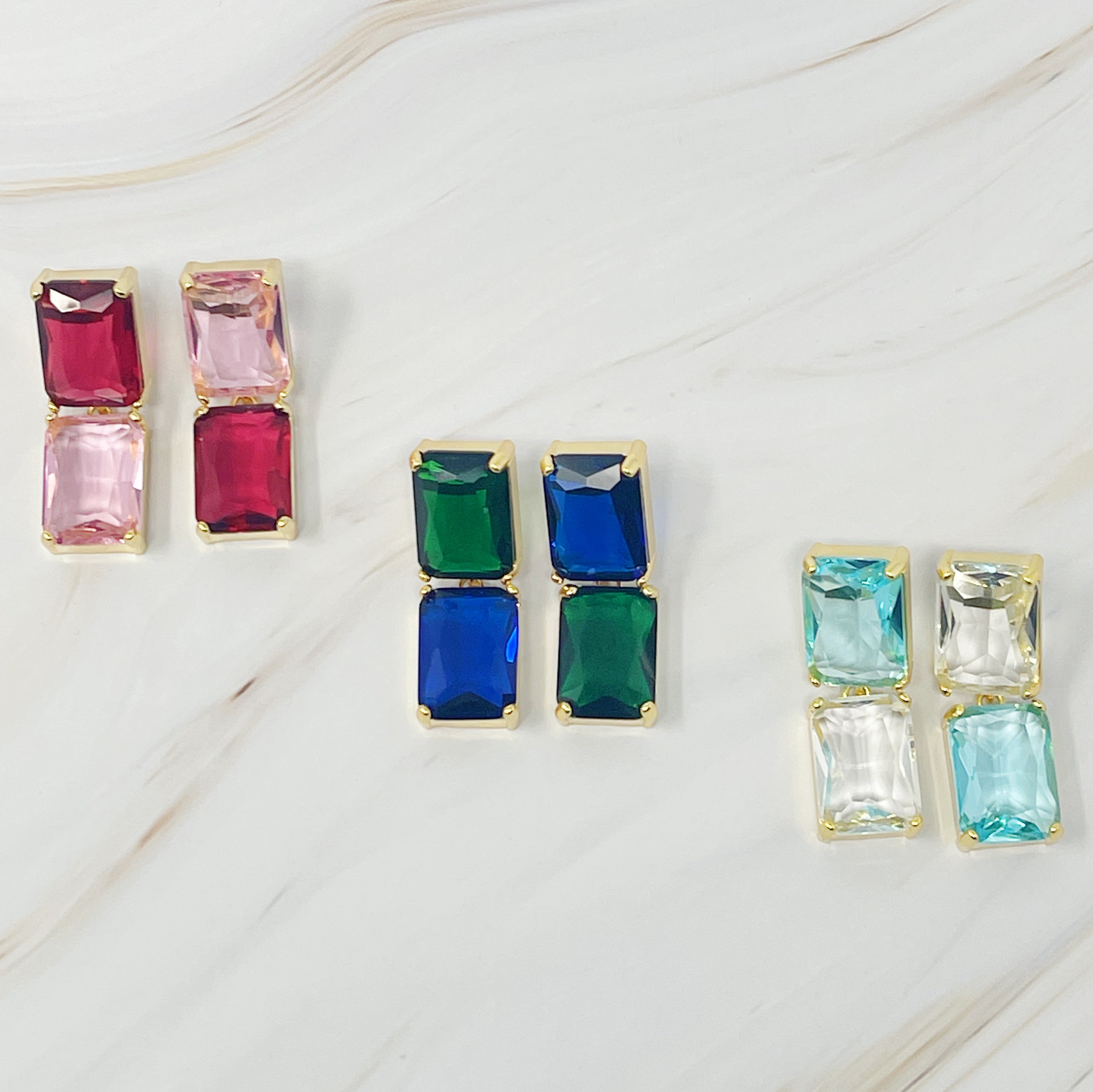 Elegant Princess Double Jeweled Earrings featuring shiny glass jewels and a unique upside-down color drop design.