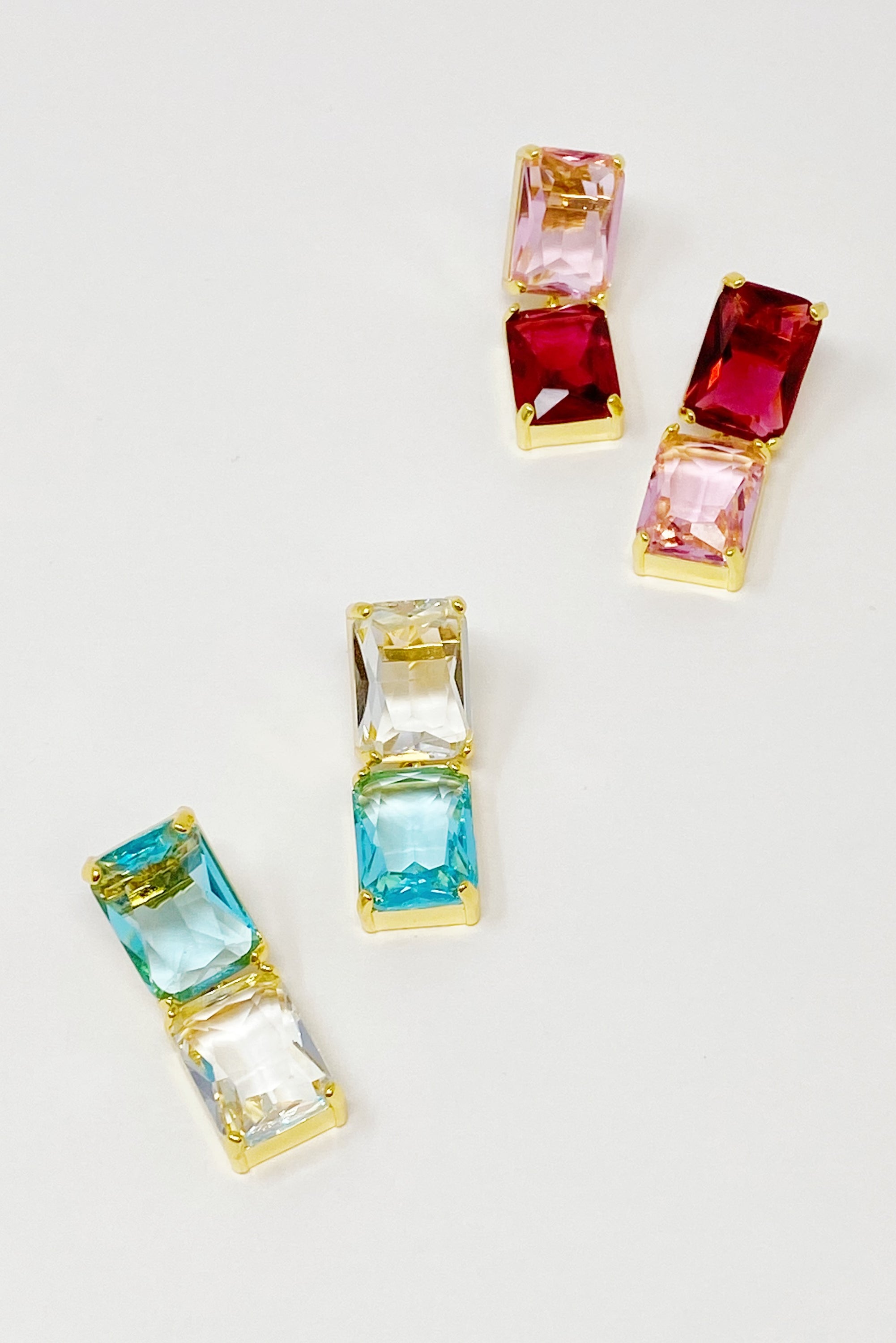 Elegant Princess Double Jeweled Earrings featuring shiny glass jewels and a unique upside-down color drop design.