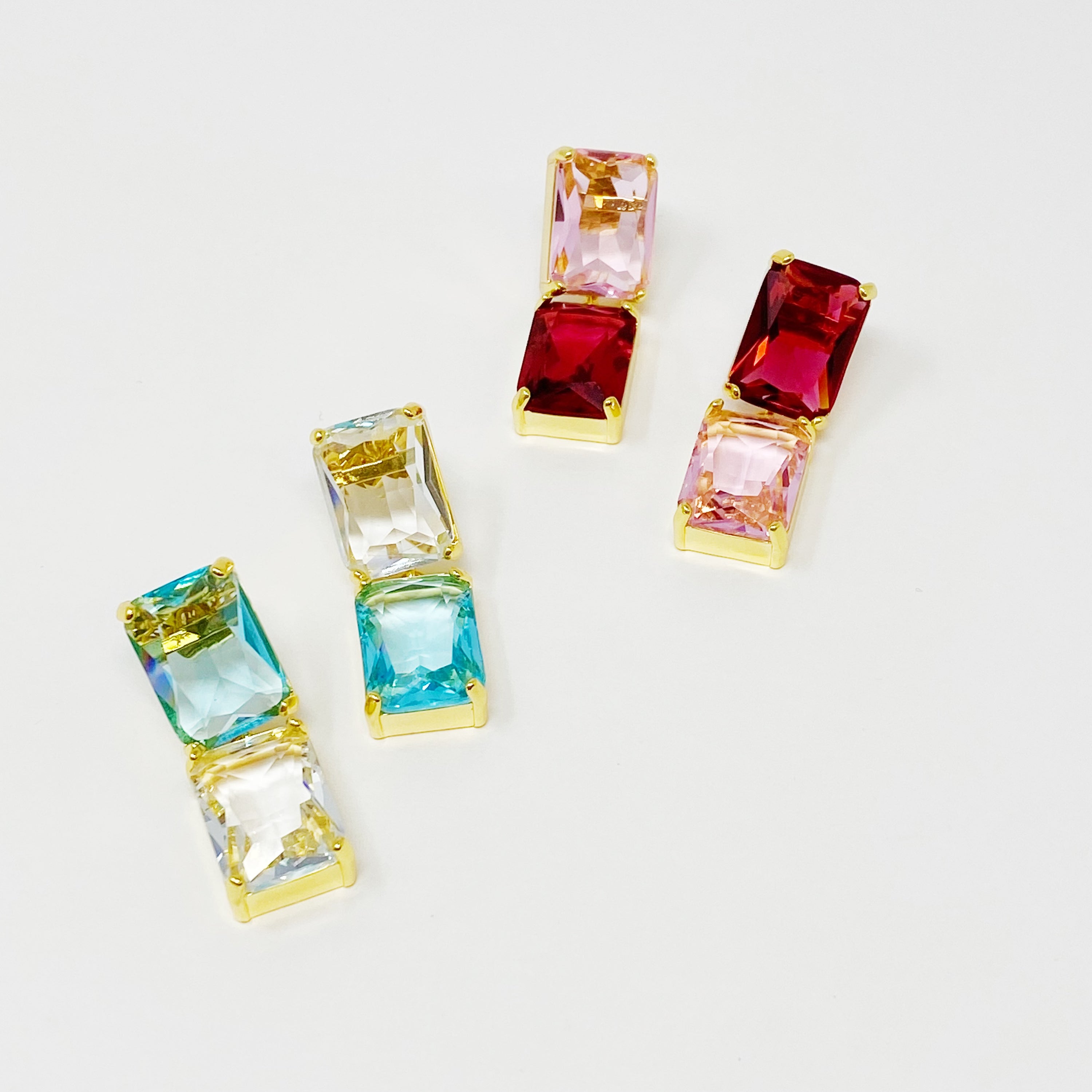 Elegant Princess Double Jeweled Earrings featuring shiny glass jewels and a unique upside-down color drop design.