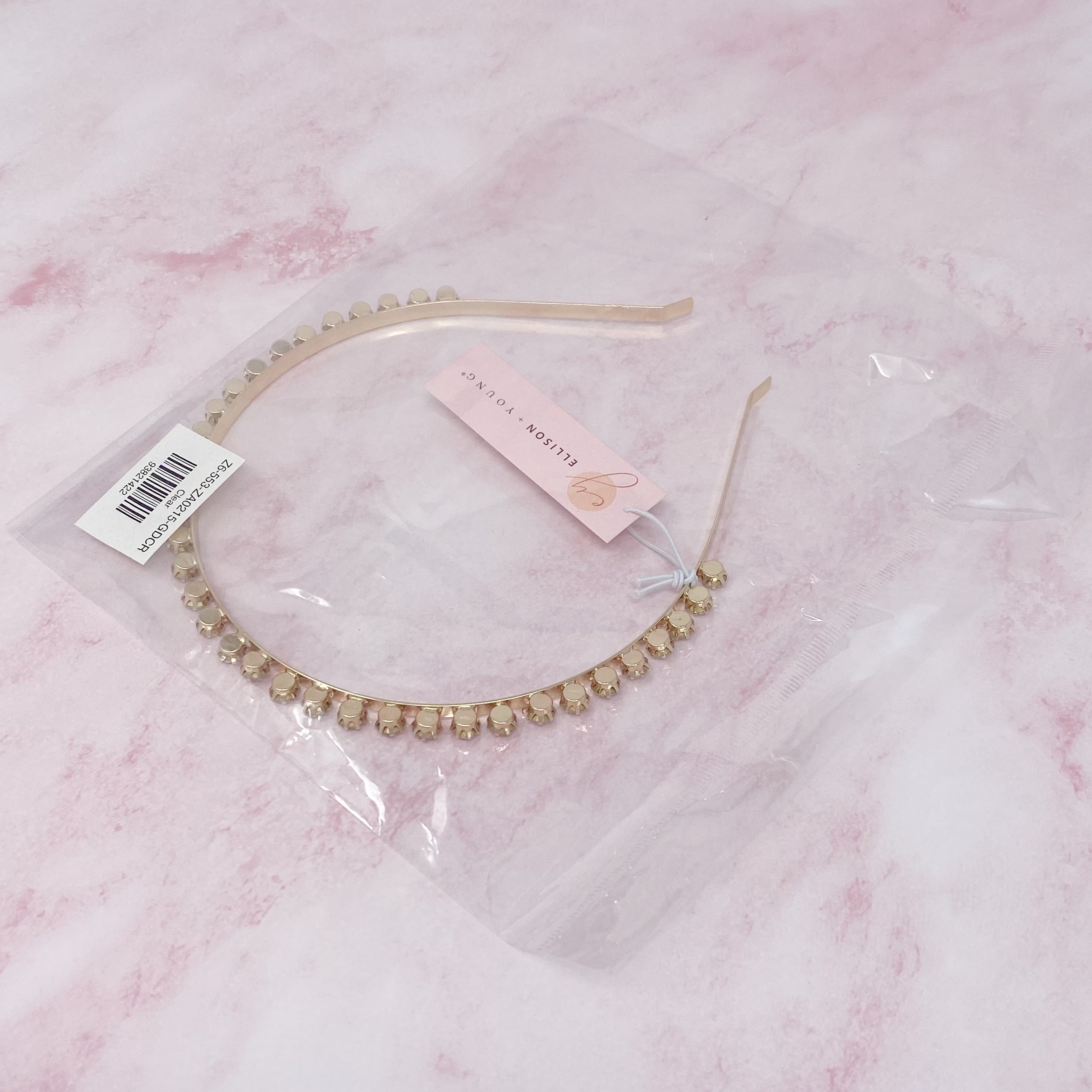 Princess Precious Crown Headband featuring sparkling stones in a classic crown design, perfect for special occasions.