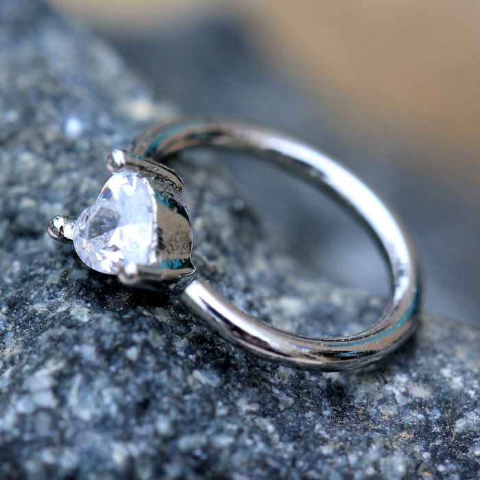 Prong Set Heart CZ Seamless Ring featuring a clear heart-shaped cubic zirconia stone, designed for cartilage or nose piercings.