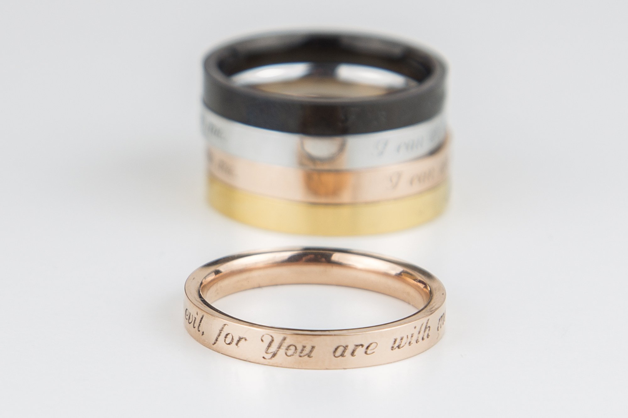 Psalm 23:4 Ring in gold finish, engraved with 'I will fear no evil, for you are with me', showcasing its delicate design and shiny surface.