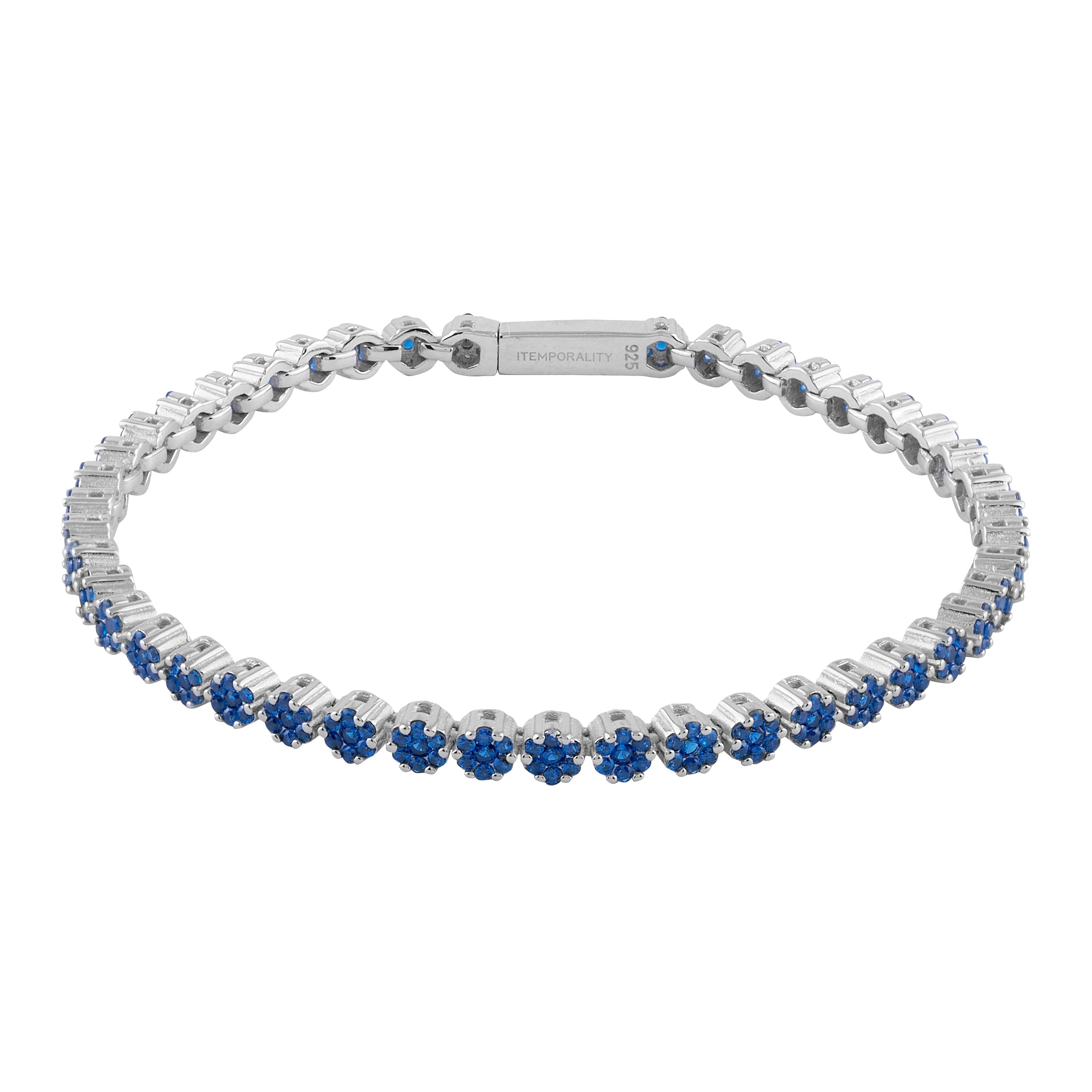 Pulsera Martina de plata con circonitas azules, elegante y sofisticada, ideal para cualquier ocasión.