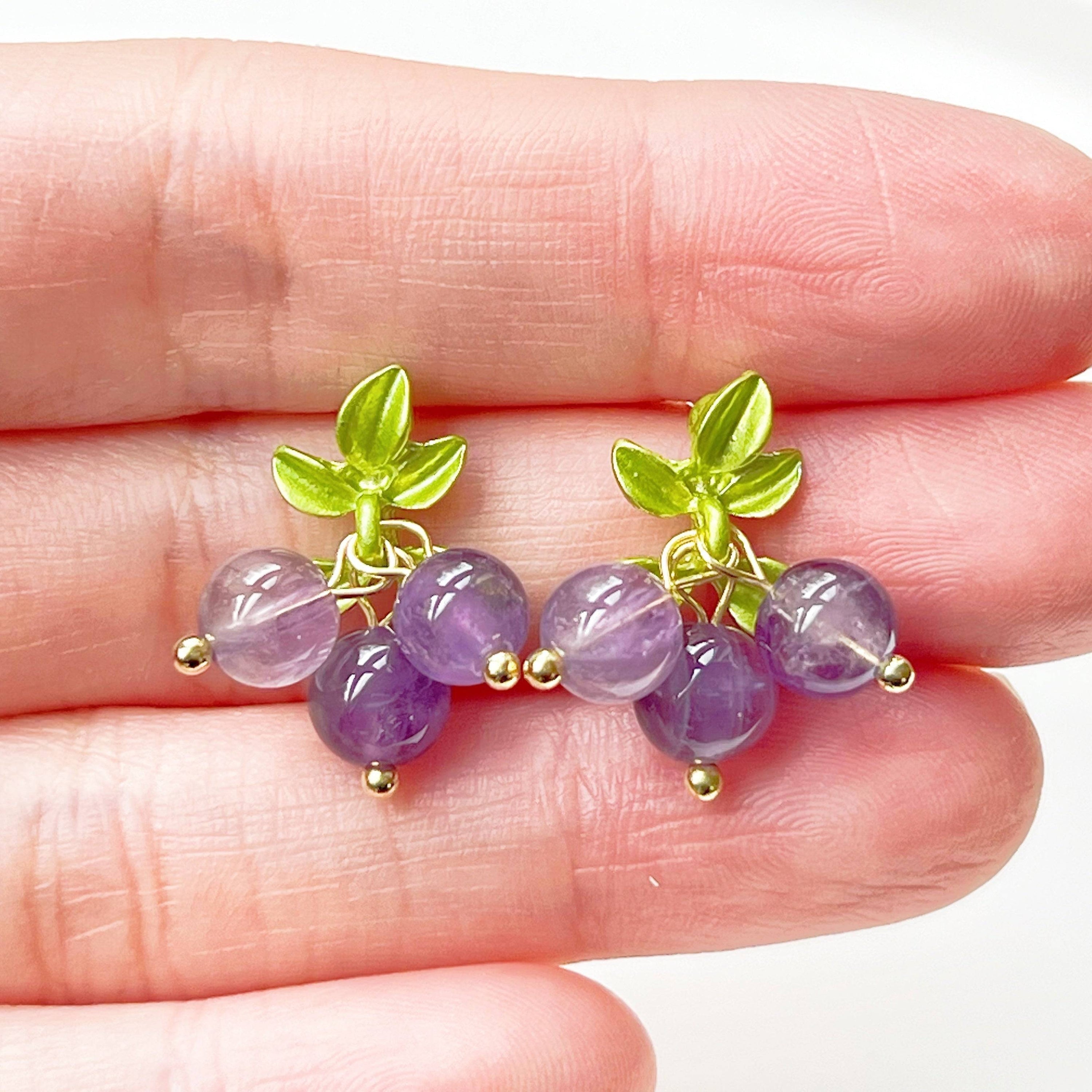 Elegant Purple Amethyst Bead Grape Earrings with gold-plated bronze base and surgical steel studs, showcasing natural purple amethyst beads.