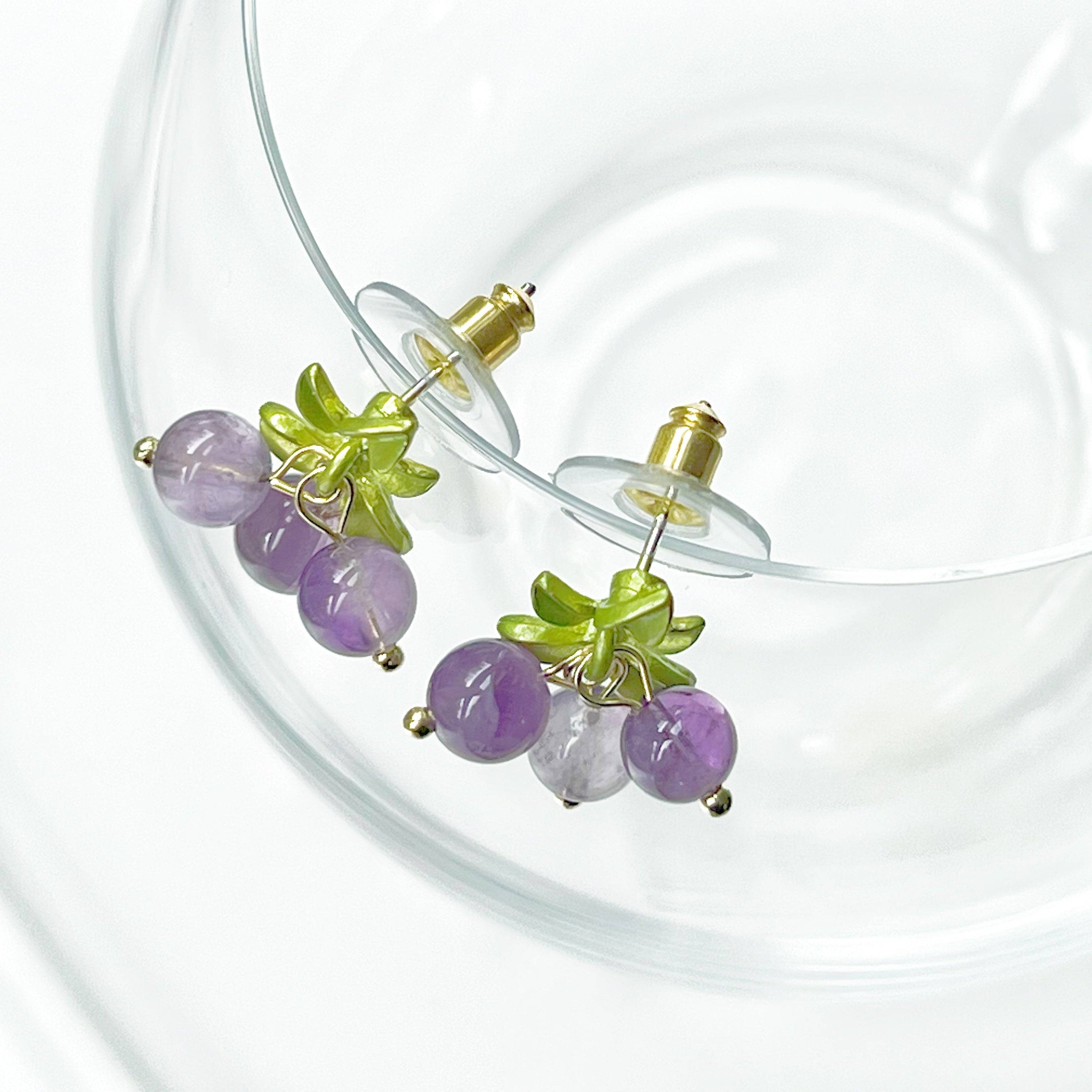 Elegant Purple Amethyst Bead Grape Earrings with gold-plated bronze base and surgical steel studs, showcasing natural purple amethyst beads.