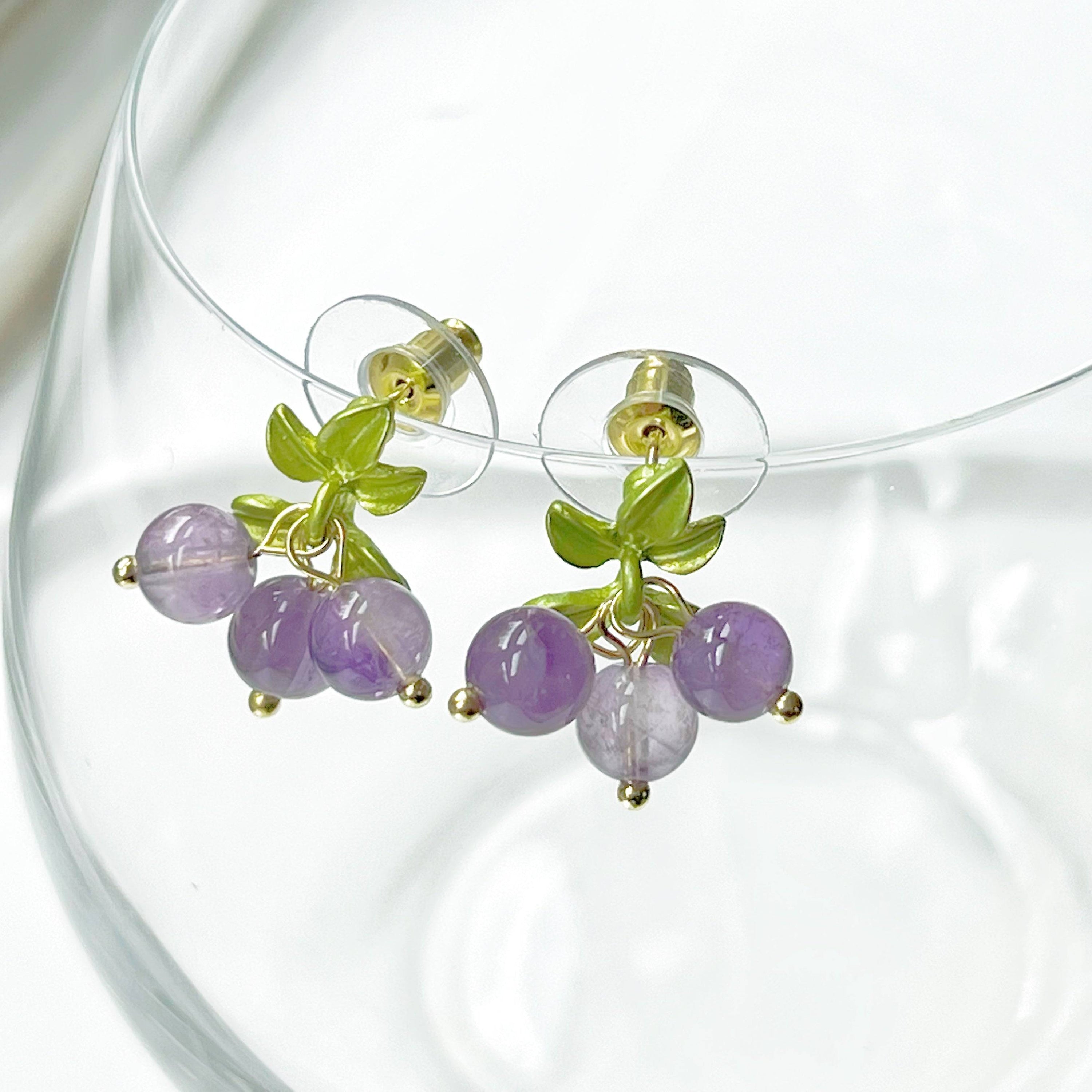 Elegant Purple Amethyst Bead Grape Earrings with gold-plated bronze base and surgical steel studs, showcasing natural purple amethyst beads.