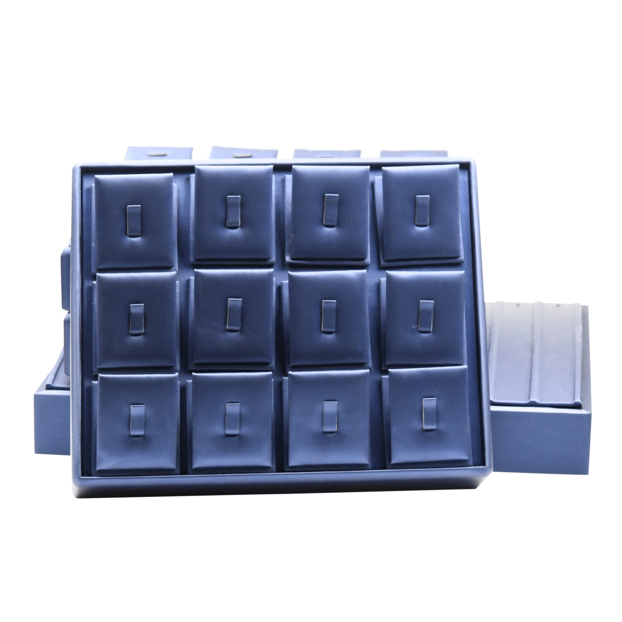 QUEENLY TRAY with white pads designed for holding 12 rings, showcasing a soft material for jewelry protection.