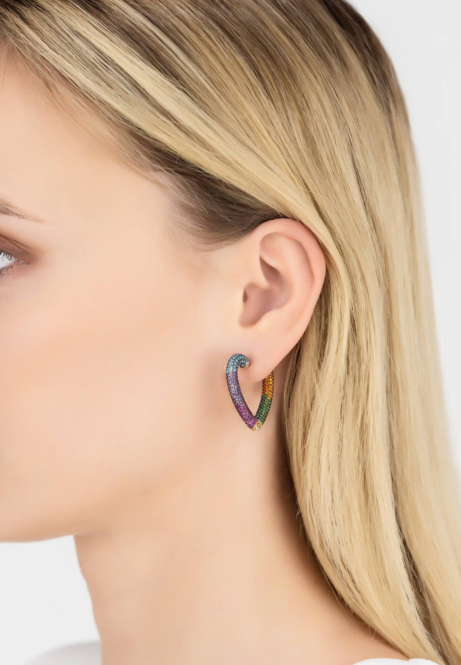 Rainbow Heart Huggie Earrings in gold with multi-coloured zirconia, featuring a heart-shaped hoop design.