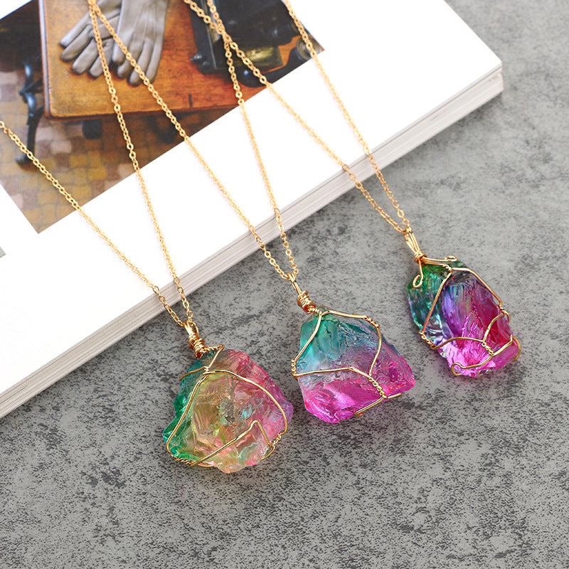 A stunning Rainbow Mineral Quartz Pendant Necklace featuring a vibrant quartz pendant set in 14K gold plating, displayed on a link chain.
