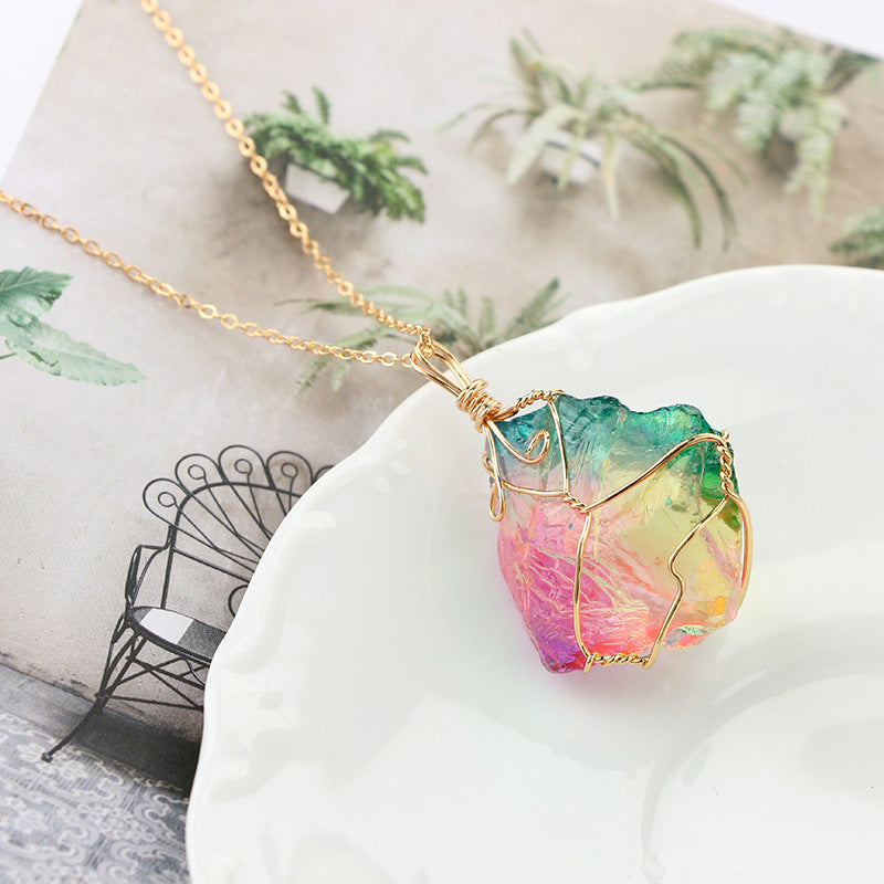 A stunning Rainbow Mineral Quartz Pendant Necklace featuring a vibrant quartz pendant set in 14K gold plating, displayed on a link chain.