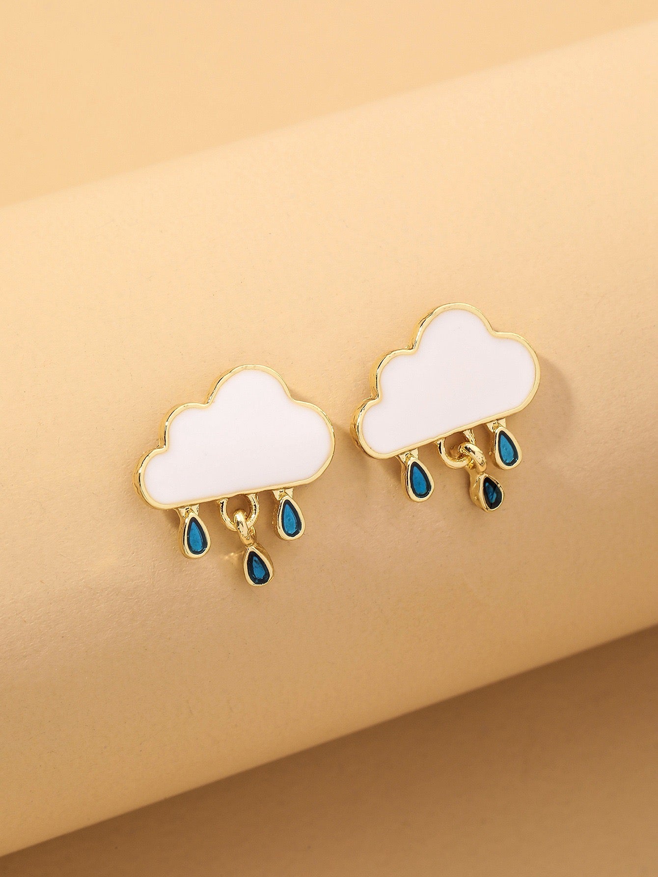 A pair of stylish Raining Cloud Short Earrings made from alloy and S925 silver, featuring a unique cloud design.