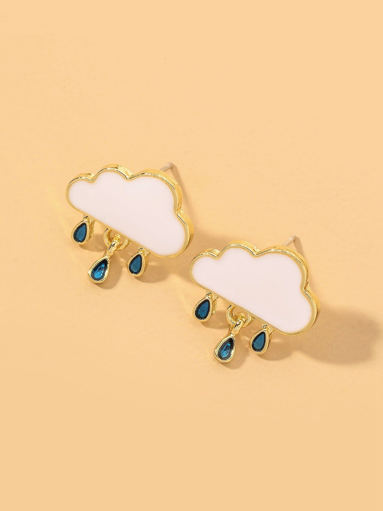 A pair of stylish Raining Cloud Short Earrings made from alloy and S925 silver, featuring a unique cloud design.