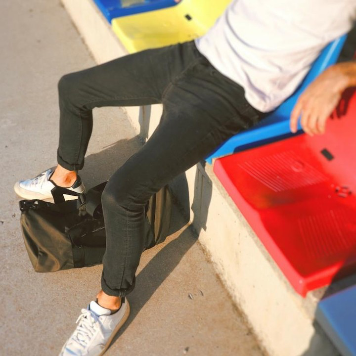 Ranger Water Resistant Duffle Vegan Gym Bag made from recycled military canvas, featuring a spacious design and adjustable shoulder strap.