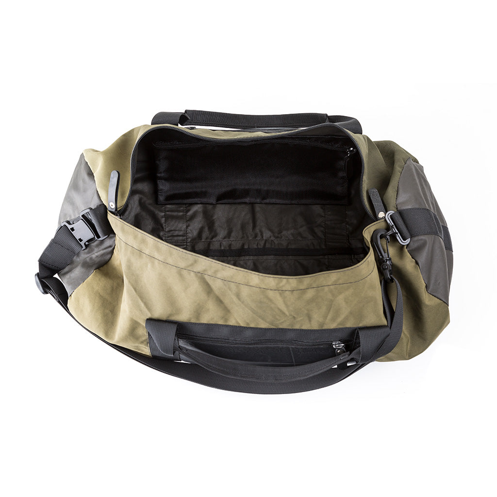 Ranger Water Resistant Duffle Vegan Gym Bag made from recycled military canvas, featuring a spacious design and adjustable shoulder strap.