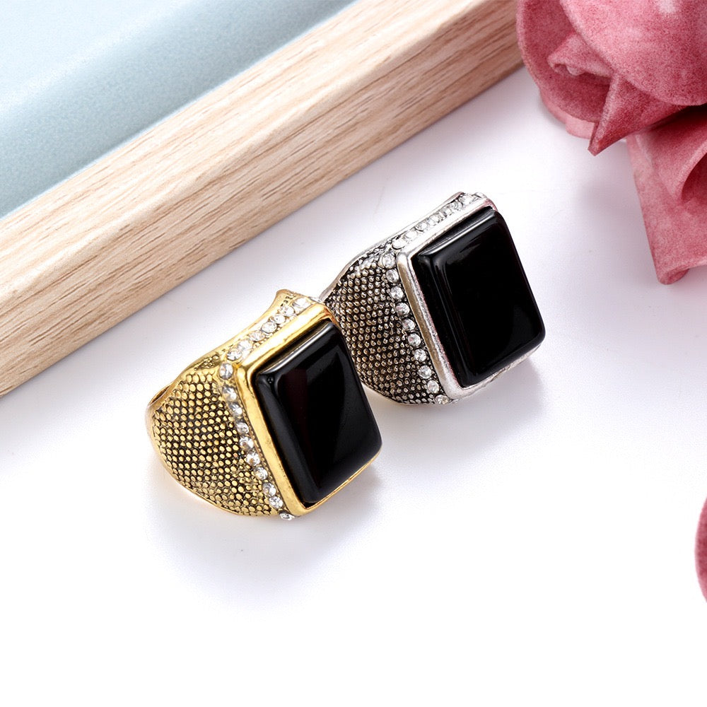 Elegant rectangle resin gemstone ring encircled by sparkling rhinestones, crafted from durable alloy.