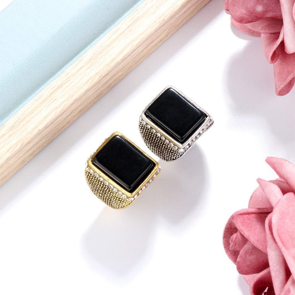 Elegant rectangle resin gemstone ring encircled by sparkling rhinestones, crafted from durable alloy.