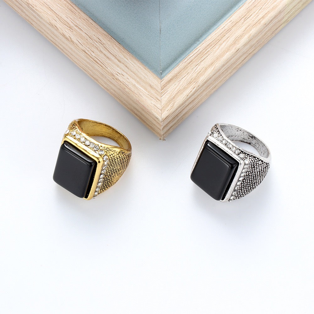 Elegant rectangle resin gemstone ring encircled by sparkling rhinestones, crafted from durable alloy.