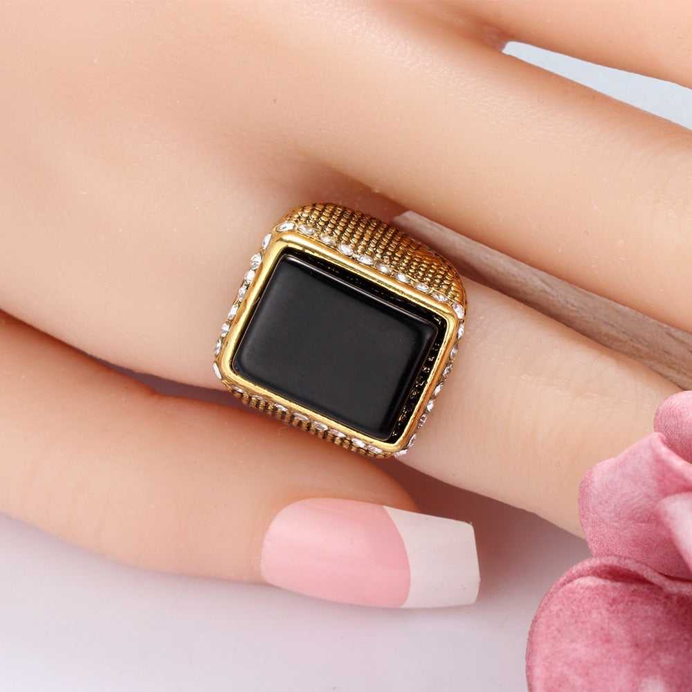 Elegant rectangle resin gemstone ring encircled by sparkling rhinestones, crafted from durable alloy.