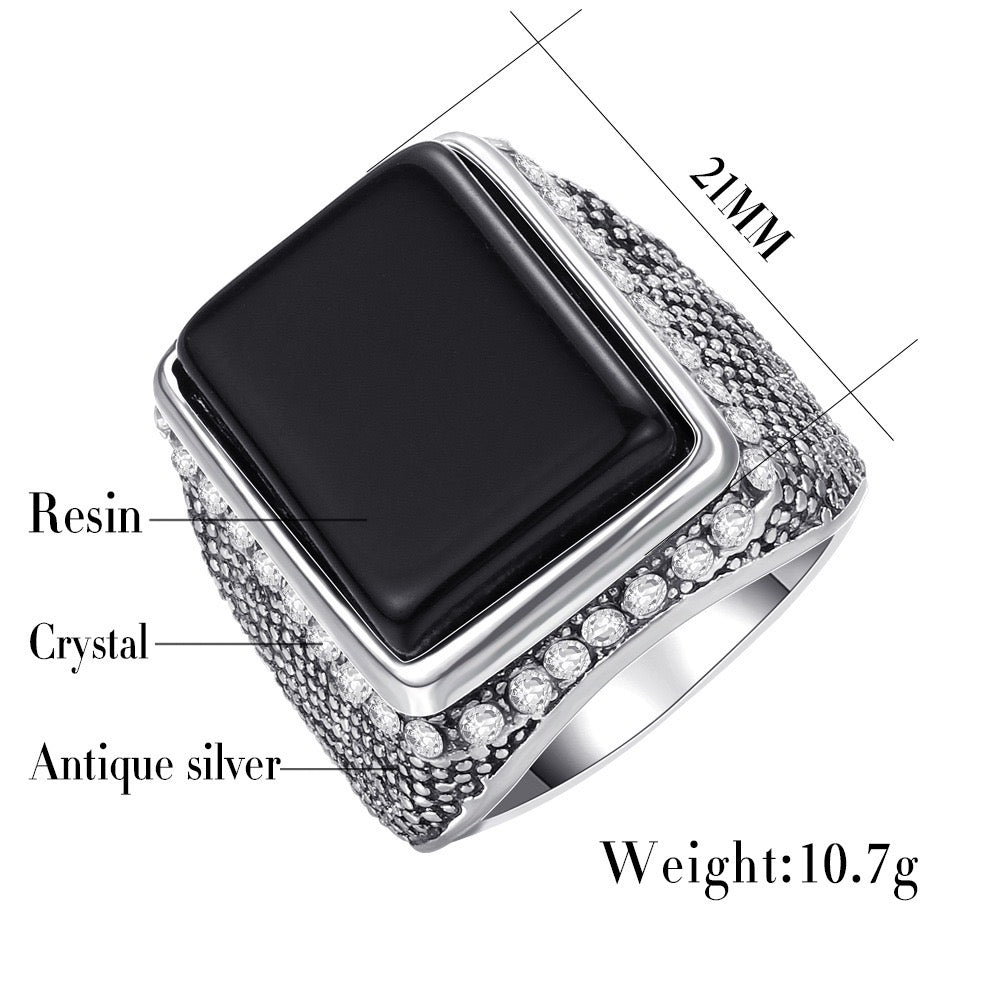 Elegant rectangle resin gemstone ring encircled by sparkling rhinestones, crafted from durable alloy.