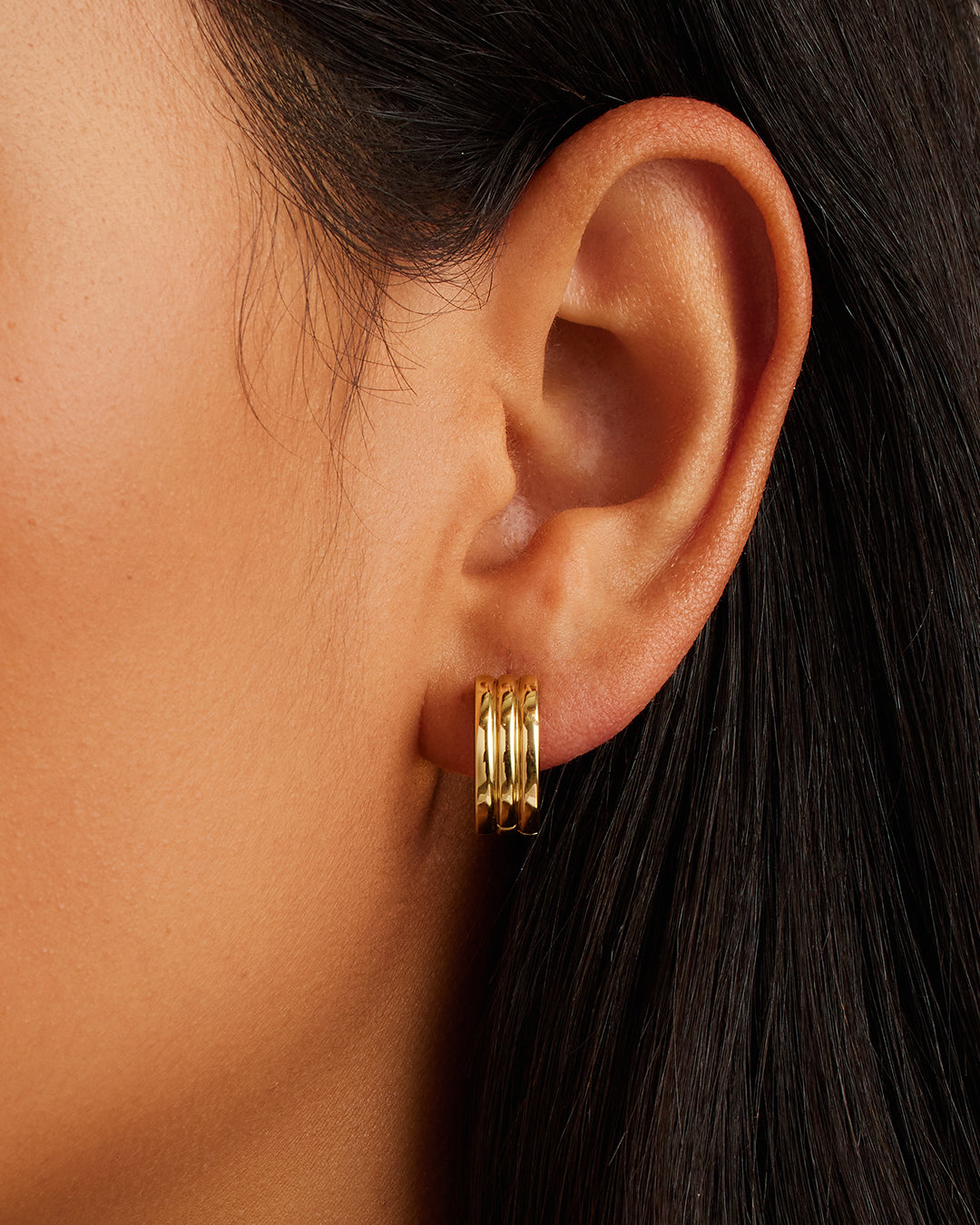 Elegant Reed Hoops showcasing a unique reed design, crafted from high-quality materials for durability and style.