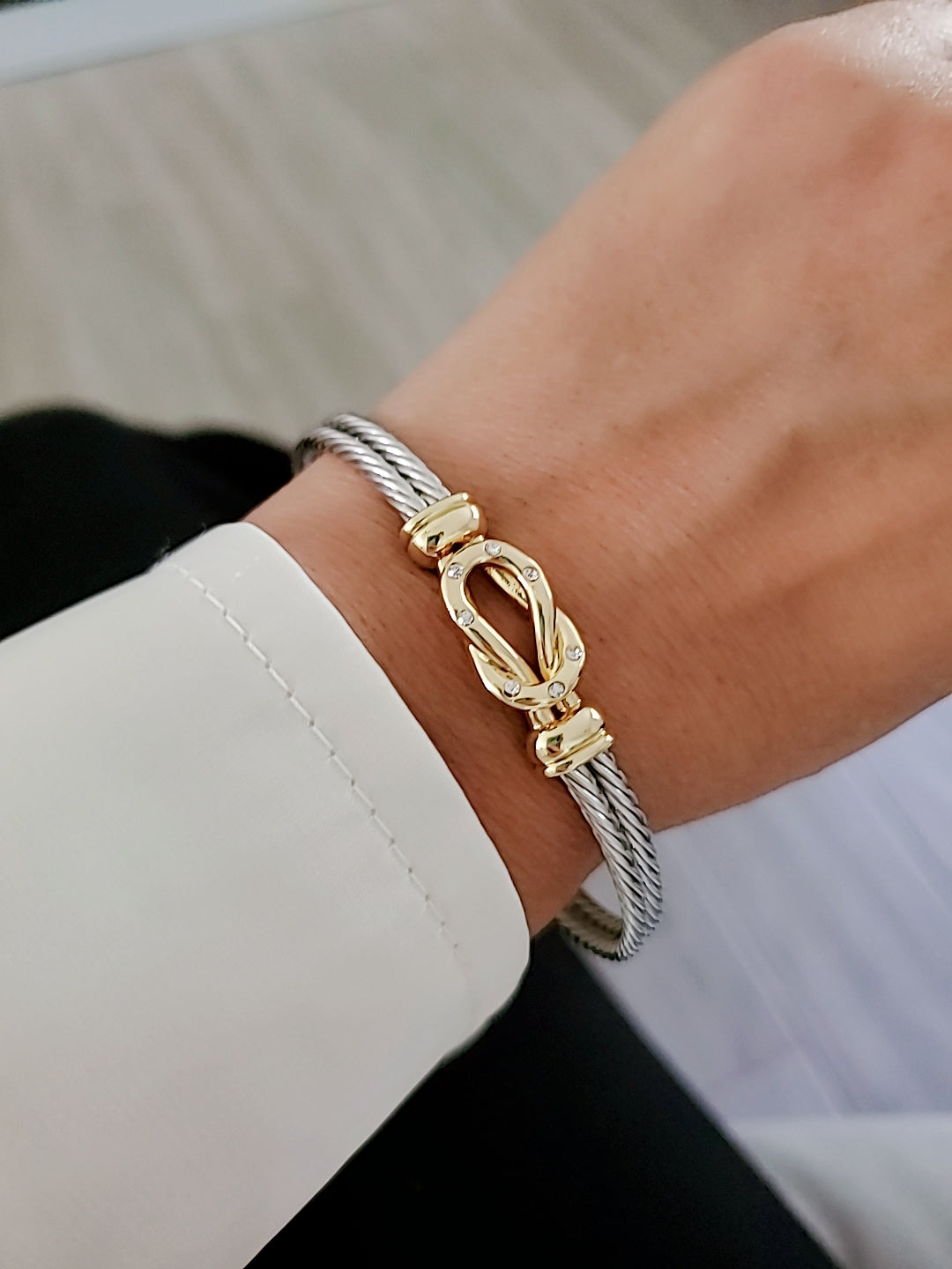 Reef Knot 18K Gold filled Silver cable bracelet featuring a double cable design and eye-catching knot pattern.