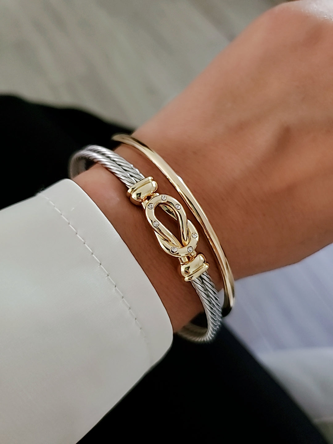 Reef Knot 18K Gold filled Silver cable bracelet featuring a double cable design and eye-catching knot pattern.