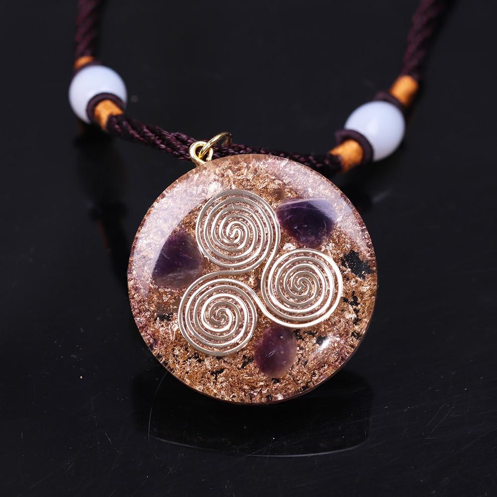 REIKI Orgonite Pendant featuring natural amethyst on a rope chain, designed for both men and women, showcasing a geometric shape.