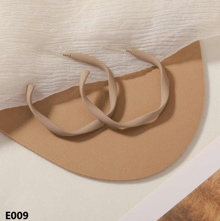 A pair of Retro Dripping Glaze Earrings featuring geometric designs and 925 silver needles, showcasing a unique vintage style.