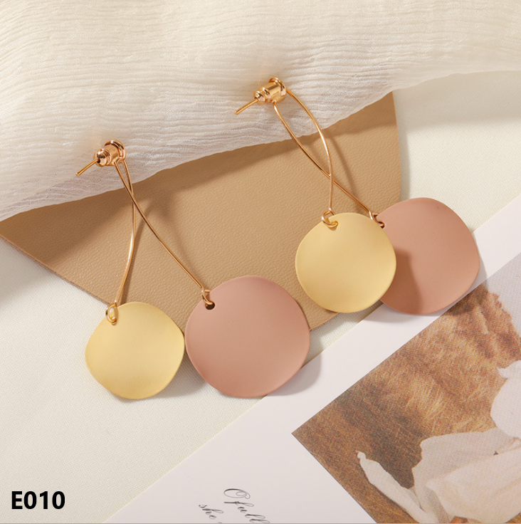 A pair of Retro Dripping Glaze Earrings featuring geometric designs and 925 silver needles, showcasing a unique vintage style.