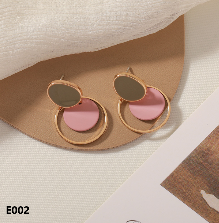 A pair of Retro Dripping Glaze Earrings featuring geometric designs and 925 silver needles, showcasing a unique vintage style.