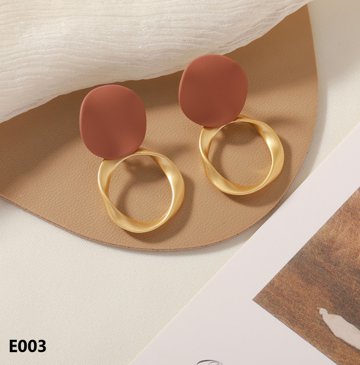 A pair of Retro Dripping Glaze Earrings featuring geometric designs and 925 silver needles, showcasing a unique vintage style.