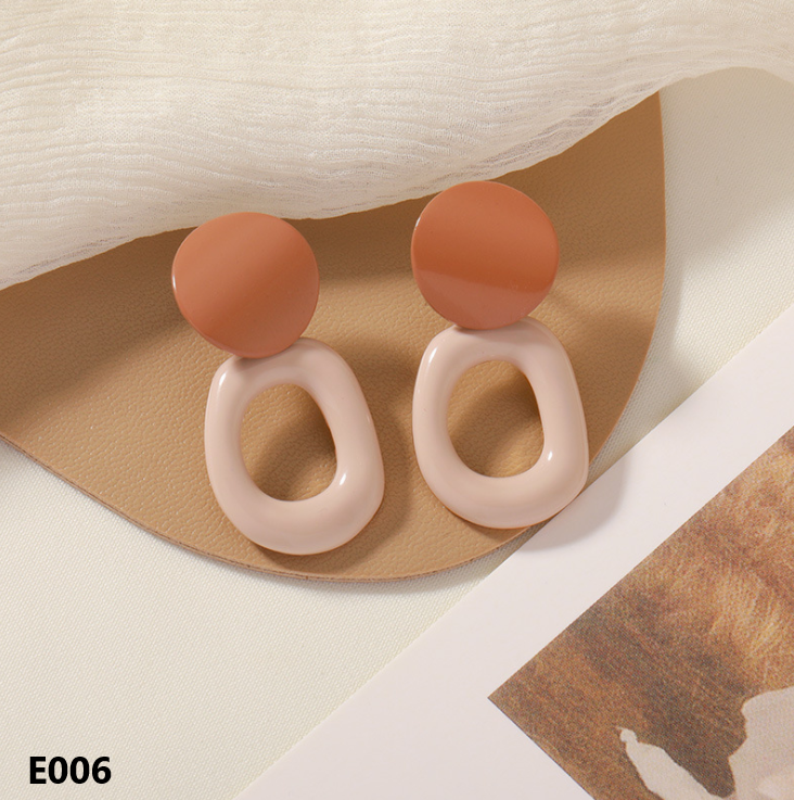 A pair of Retro Dripping Glaze Earrings featuring geometric designs and 925 silver needles, showcasing a unique vintage style.