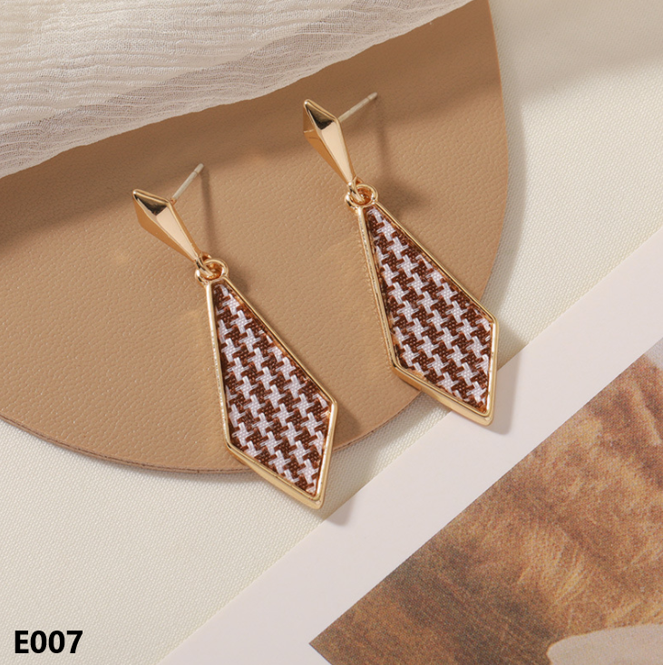A pair of Retro Dripping Glaze Earrings featuring geometric designs and 925 silver needles, showcasing a unique vintage style.