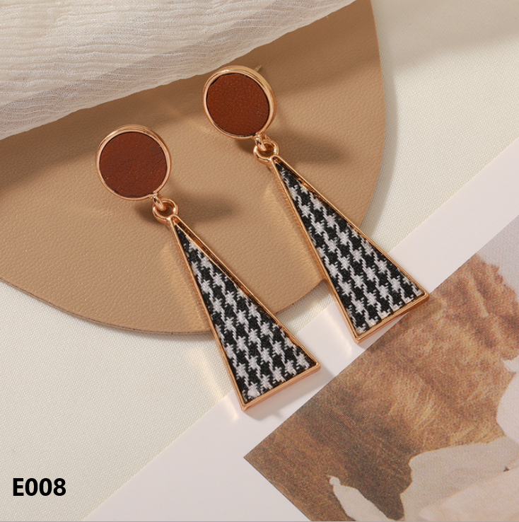 A pair of Retro Dripping Glaze Earrings featuring geometric designs and 925 silver needles, showcasing a unique vintage style.