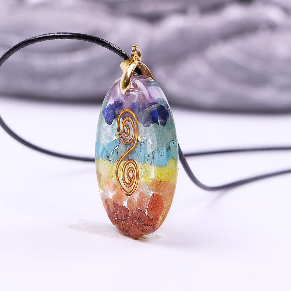 Colorful quartz stone pendant necklace featuring various healing crystals, set in a zinc alloy frame with a rope chain.