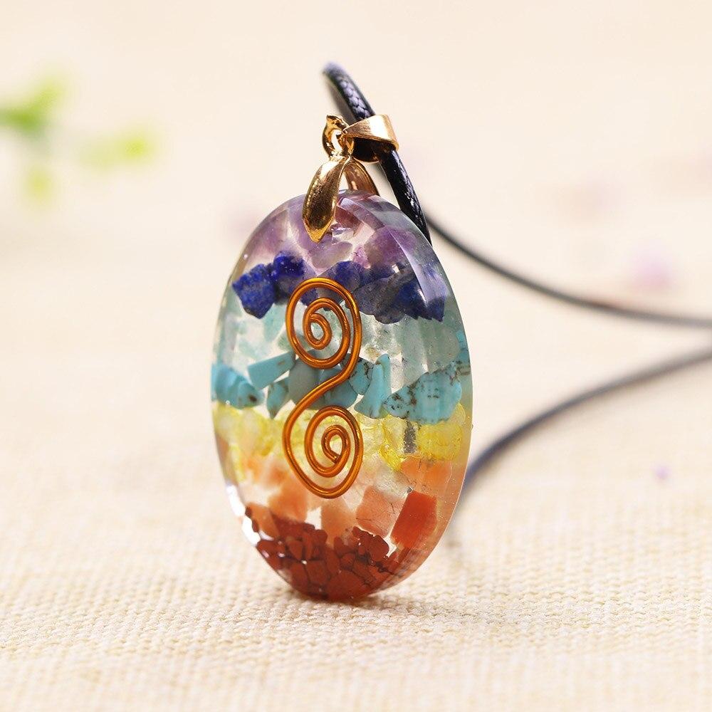 Colorful quartz stone pendant necklace featuring various healing crystals, set in a zinc alloy frame with a rope chain.