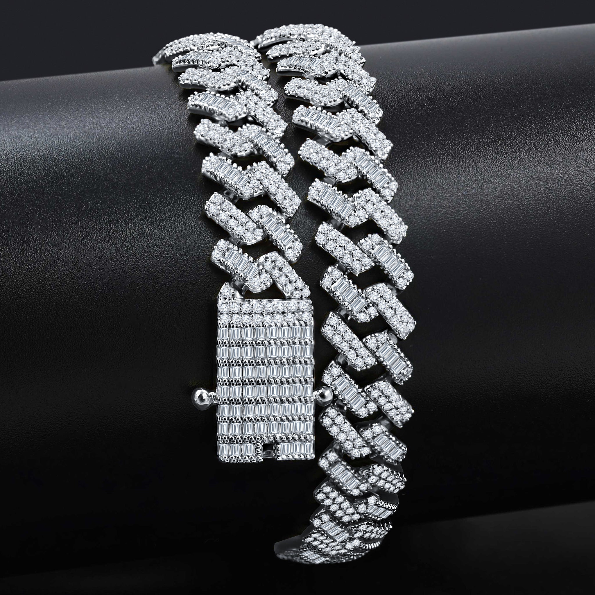 Rime Sterling Silver 12MM CZ Chain featuring hand-set cubic zirconia stones, showcasing its elegant design and durable construction.