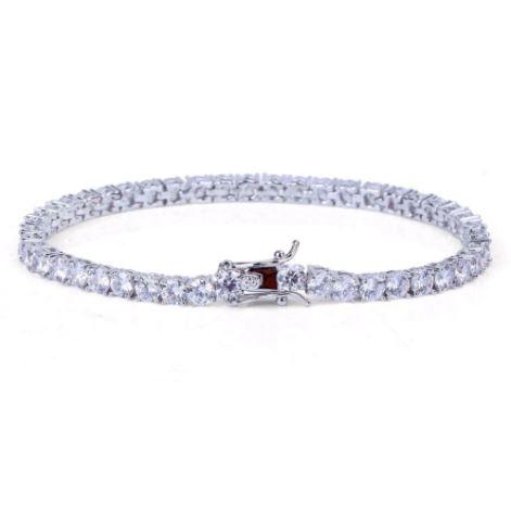 ROCK 4MM One Row Tennis Bracelet featuring cubic zirconia stones set in brass metal, showcasing a glamorous design suitable for any occasion.