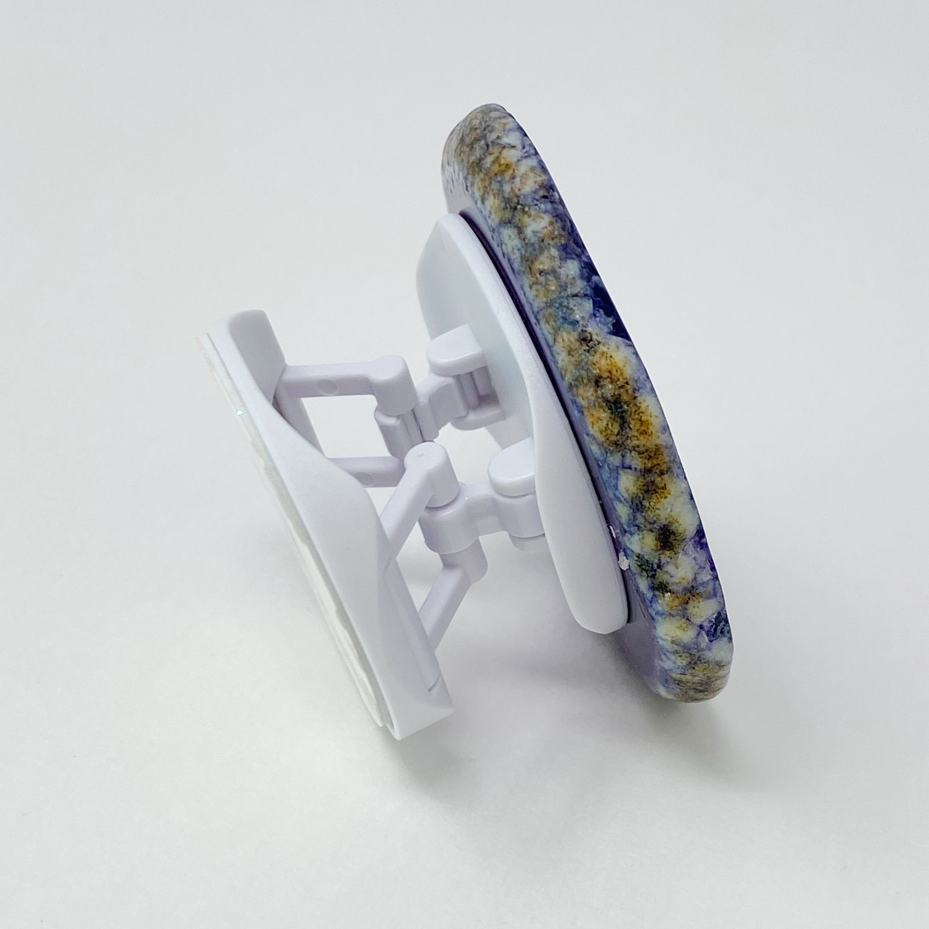 Rock Edge Natural Stone Device Grip featuring a unique natural stone slice with smooth edges, designed for mobile phones and tablets.