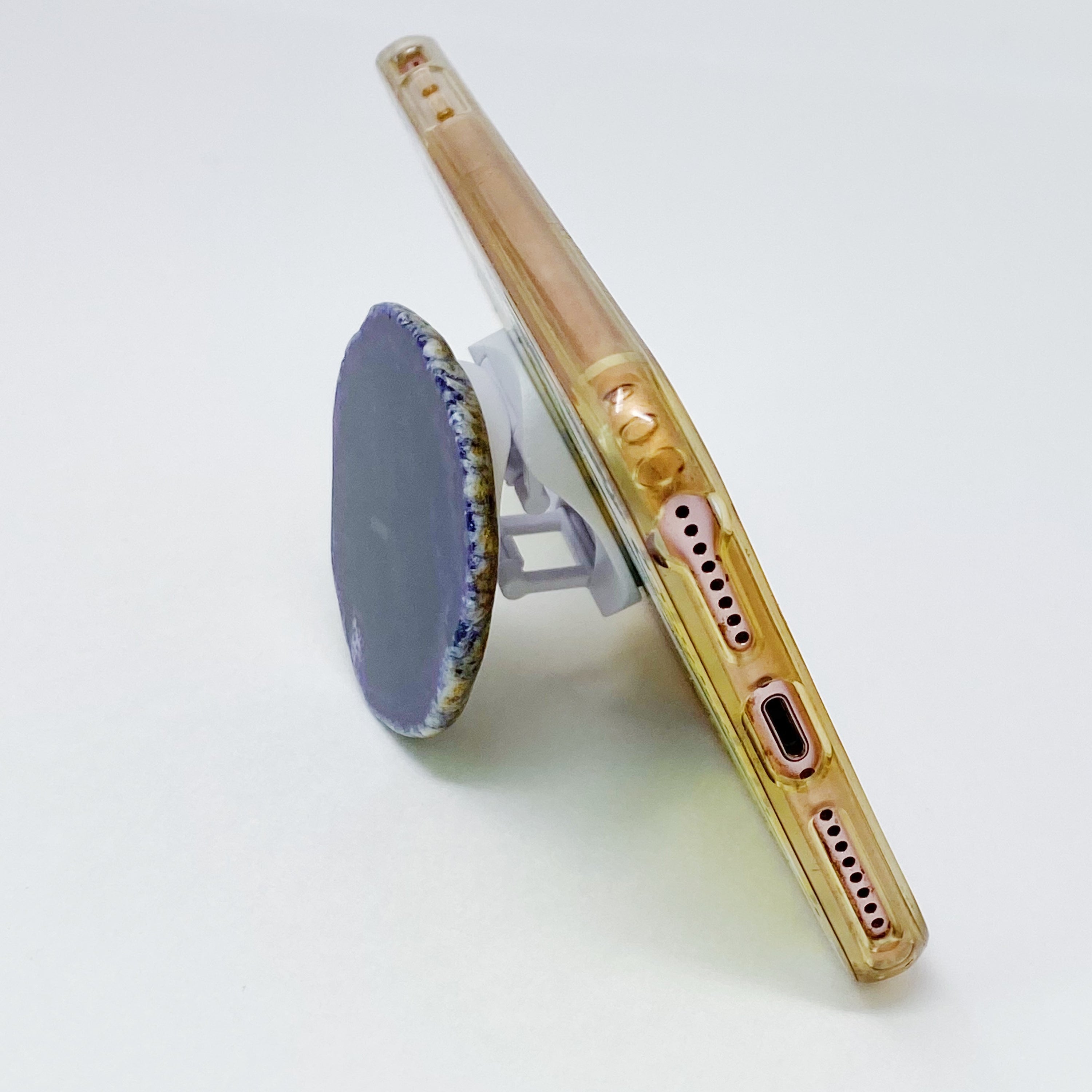 Rock Edge Natural Stone Device Grip featuring a unique natural stone slice with smooth edges, designed for mobile phones and tablets.