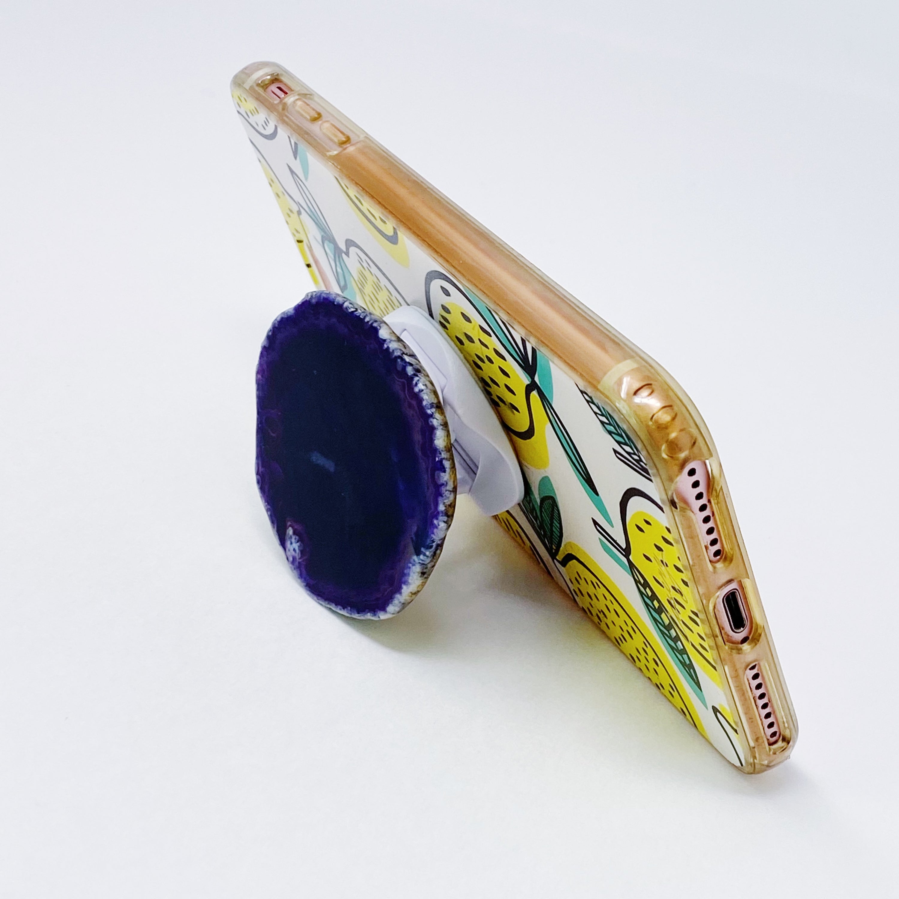 Rock Edge Natural Stone Device Grip featuring a unique natural stone slice with smooth edges, designed for mobile phones and tablets.