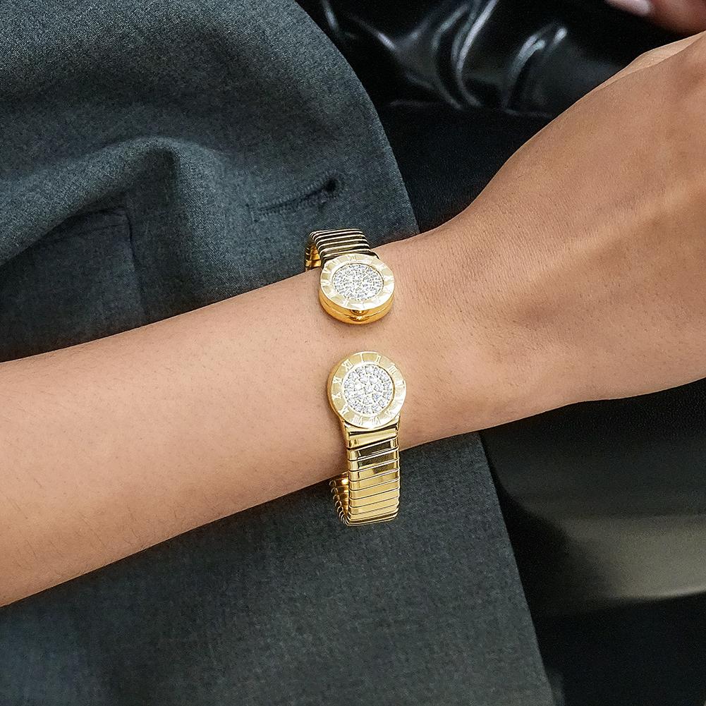 Elegant Roman Numerals Cuff Bangle made of stainless steel with gold plating.