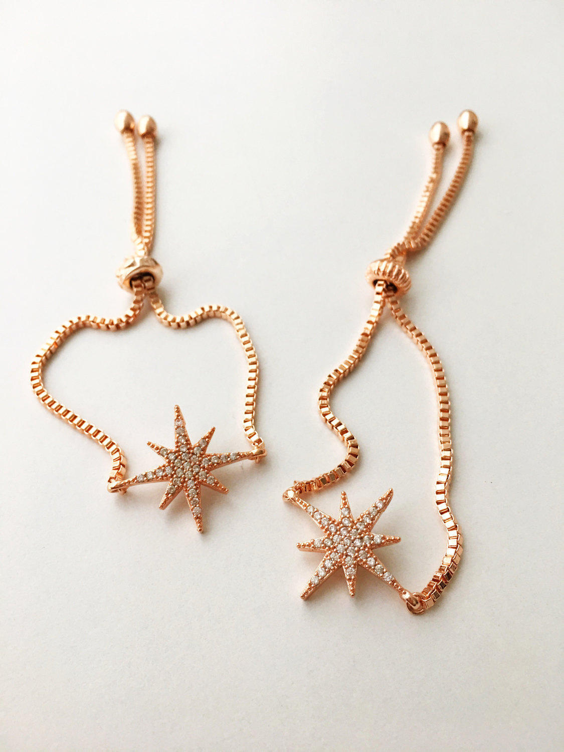 Handmade Rose Gold Star Bracelet featuring a zircon charm, adjustable design, and tarnish-resistant stainless steel material.