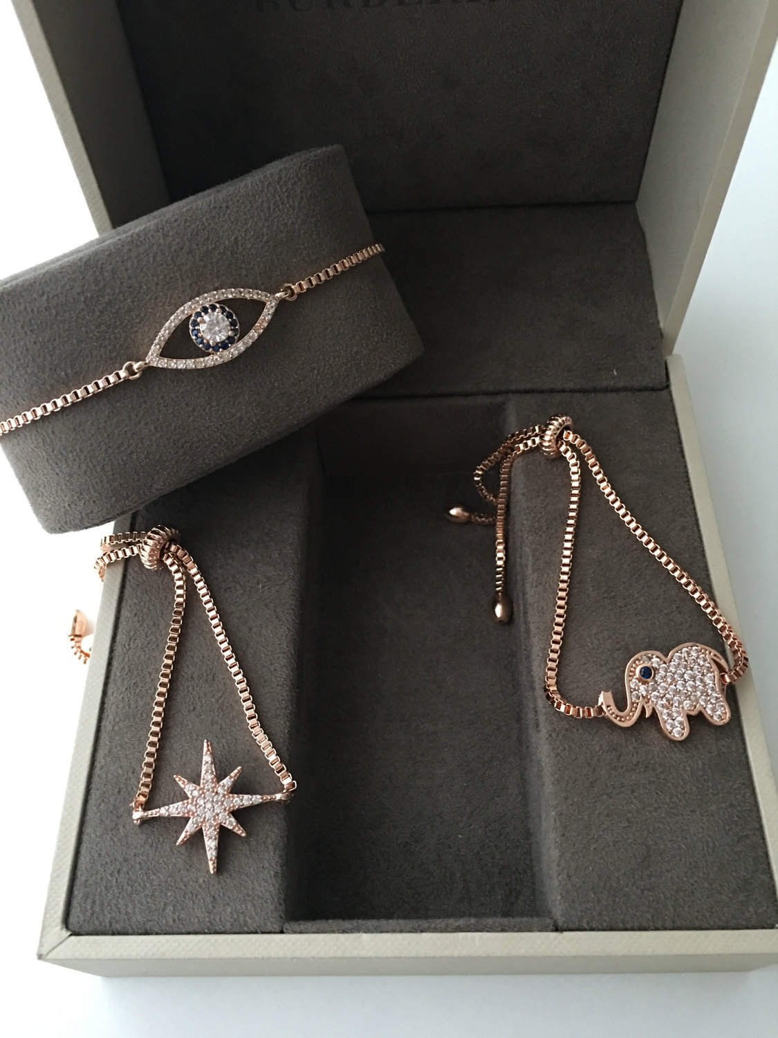 Handmade Rose Gold Star Bracelet featuring a zircon charm, adjustable design, and tarnish-resistant stainless steel material.