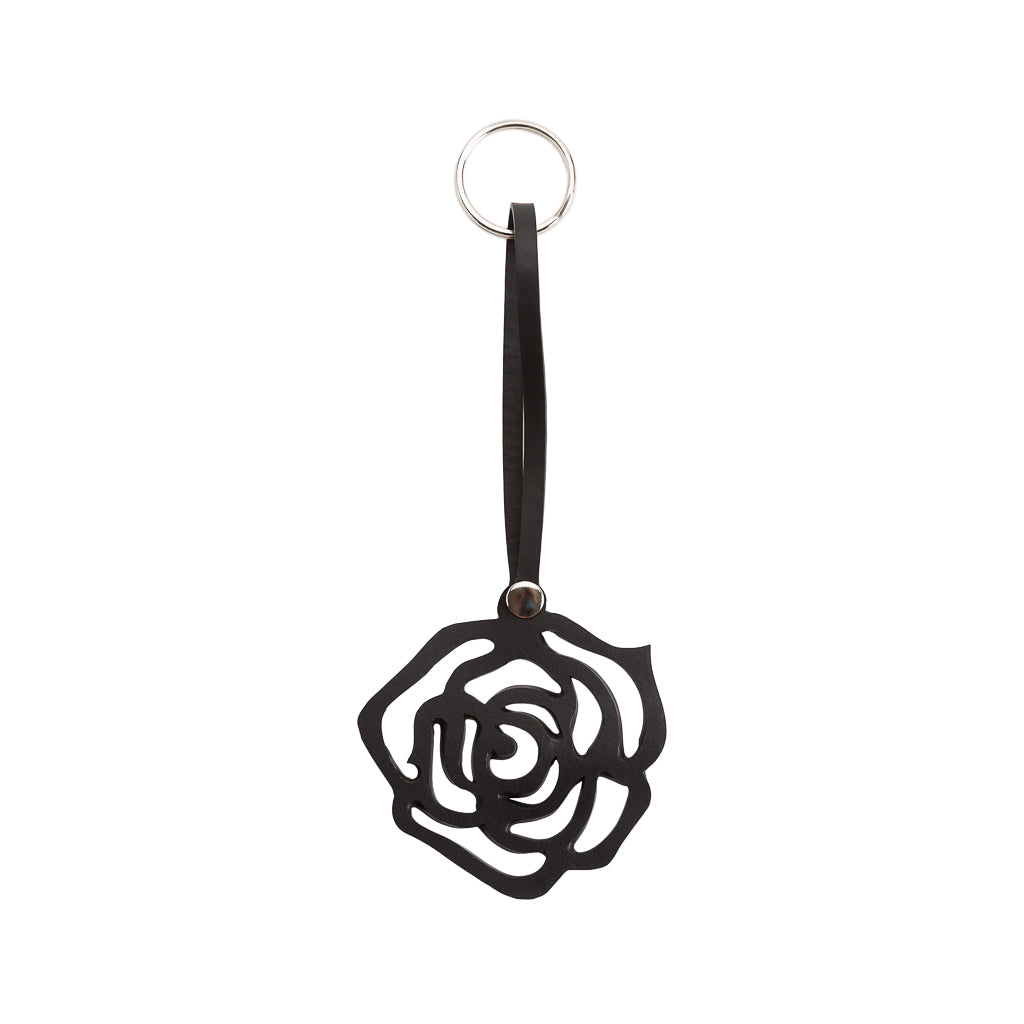A beautifully handcrafted Rose keyring made from recycled rubber, featuring a unique leather-like texture and secure snap clip.