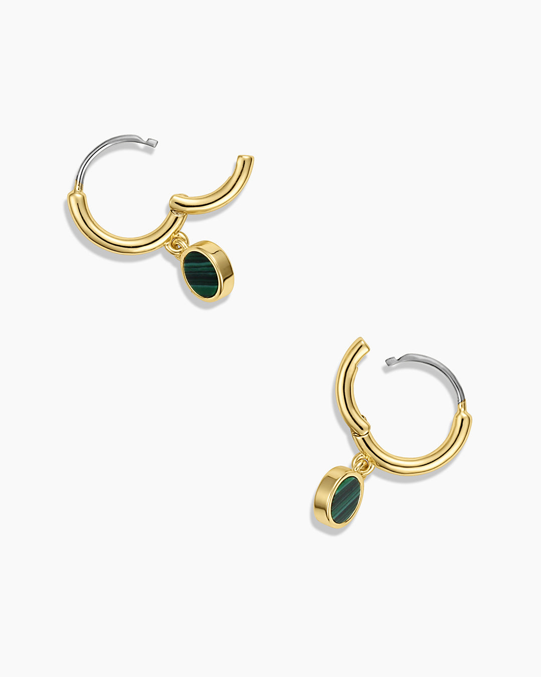 A pair of elegant Rose Marble Coin Huggies earrings featuring unique rose marble coins and a secure huggie closure.