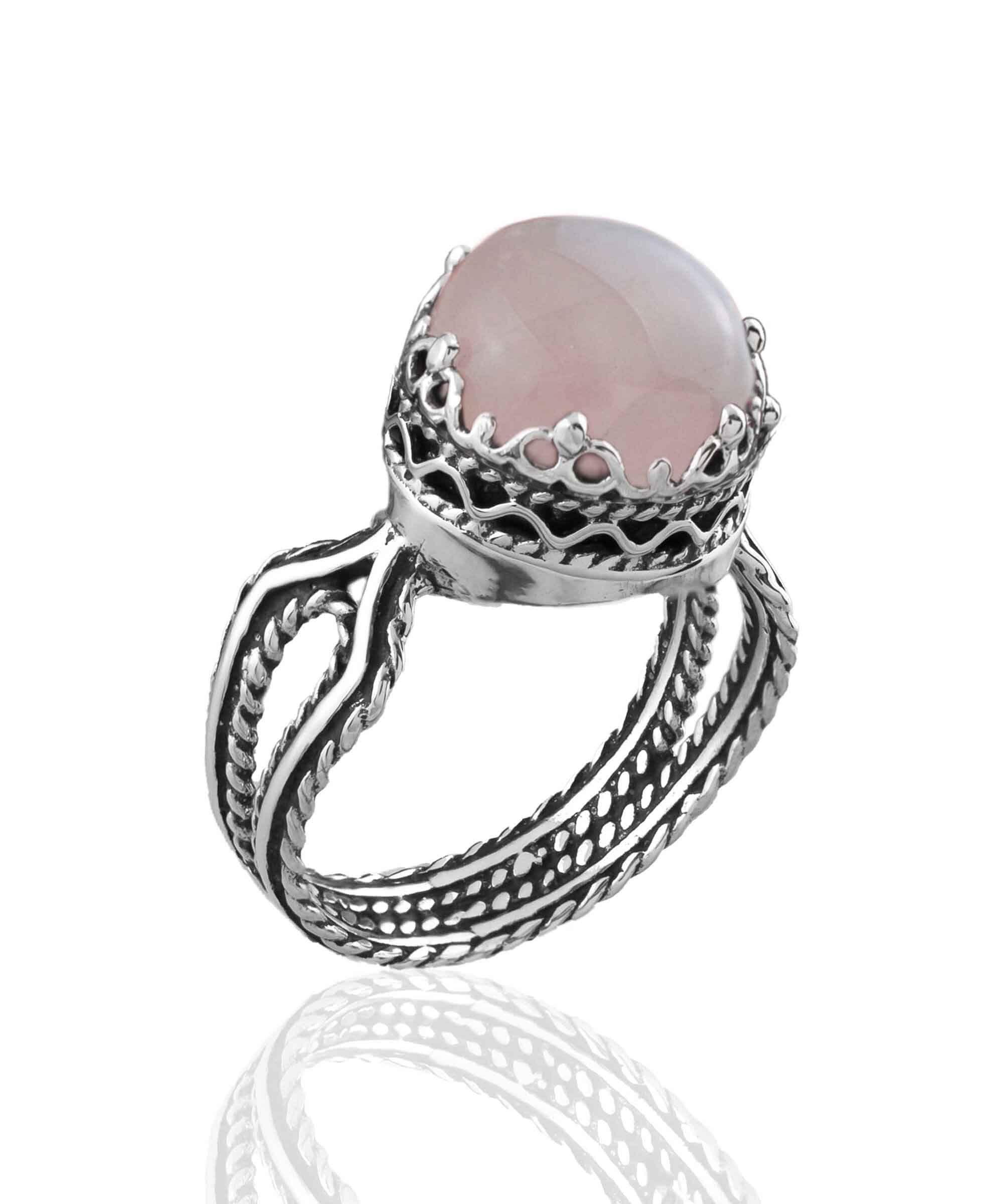 Elegant Rose Quartz Gemstone Filigree Art Sterling Silver Cocktail Ring featuring a round cut pink stone and intricate metalwork design.