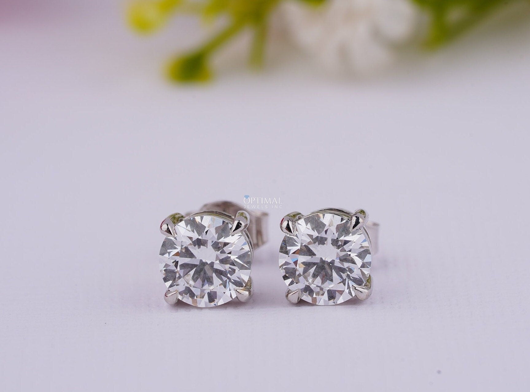 Elegant Round Cut Lab Diamond Earrings in white gold, featuring 1.00 Ctw IGI certified lab-grown diamonds, perfect for gifting.